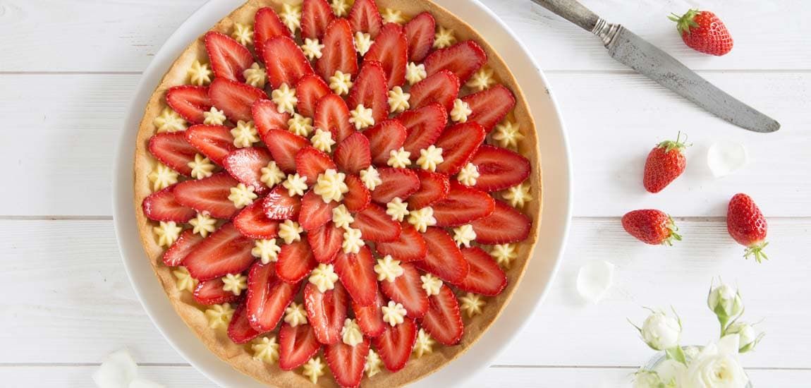 Éveillez vos papilles avec la tarte aux fraises : 5 secrets pour la réussir